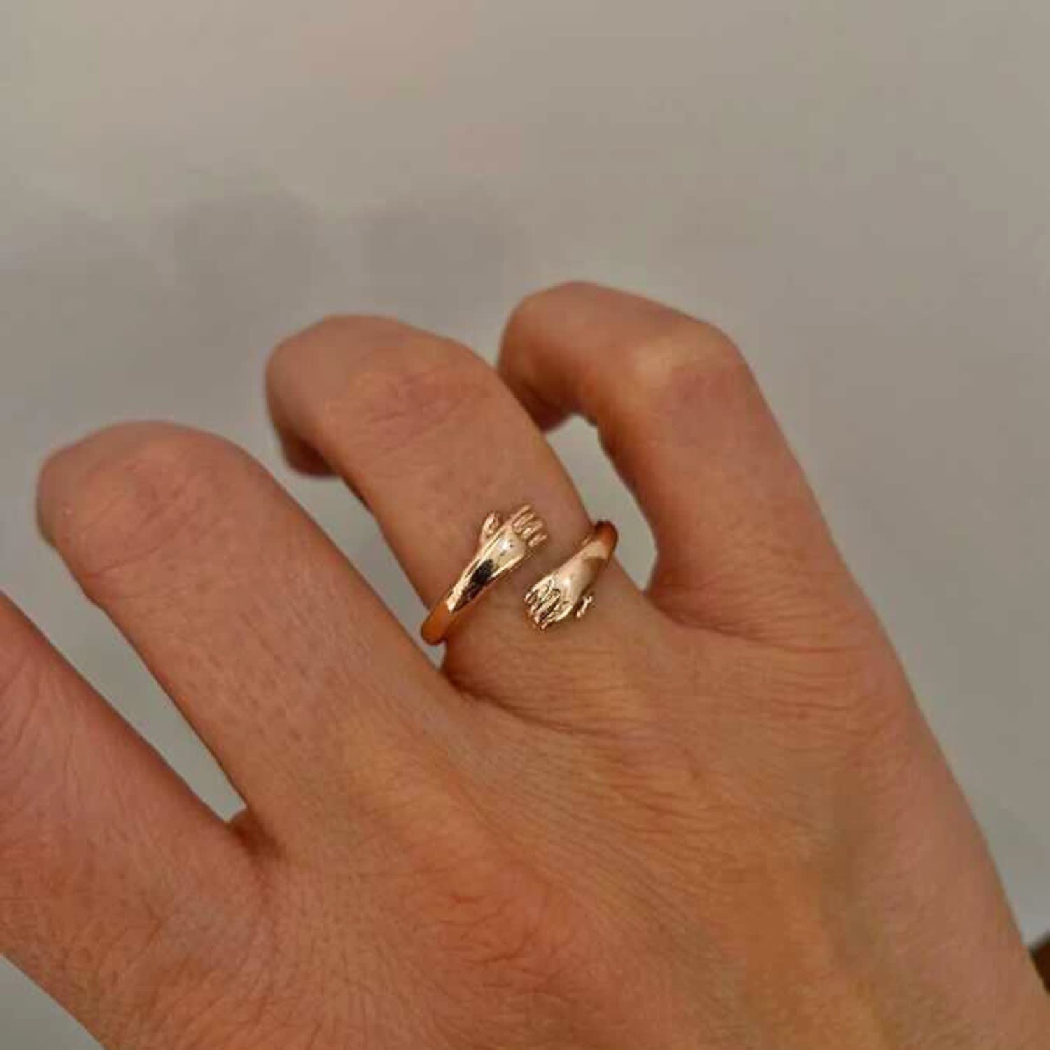 Hug Ring With Hands Sterling Silver Rose Gold Spero London