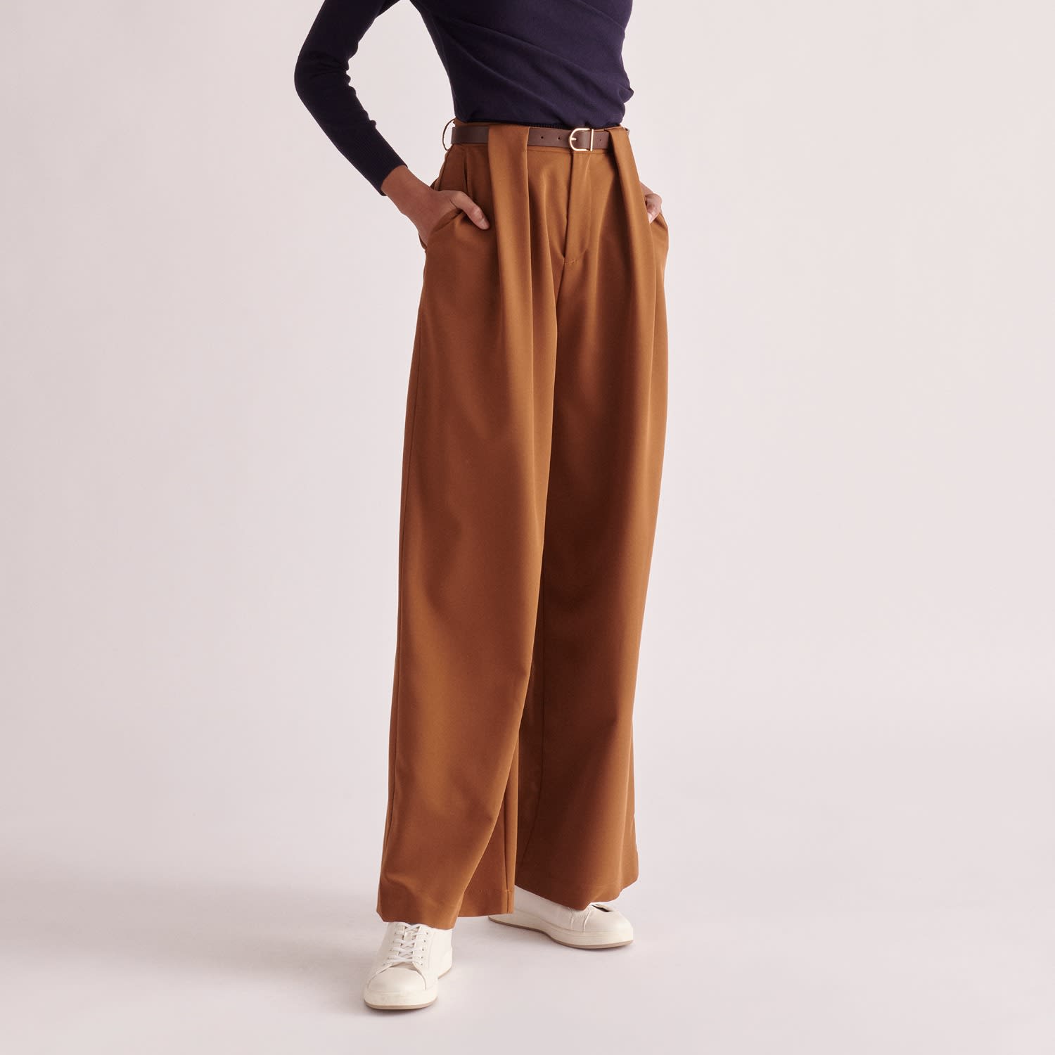 Belted Pleated Trousers In Brown by PAISIE