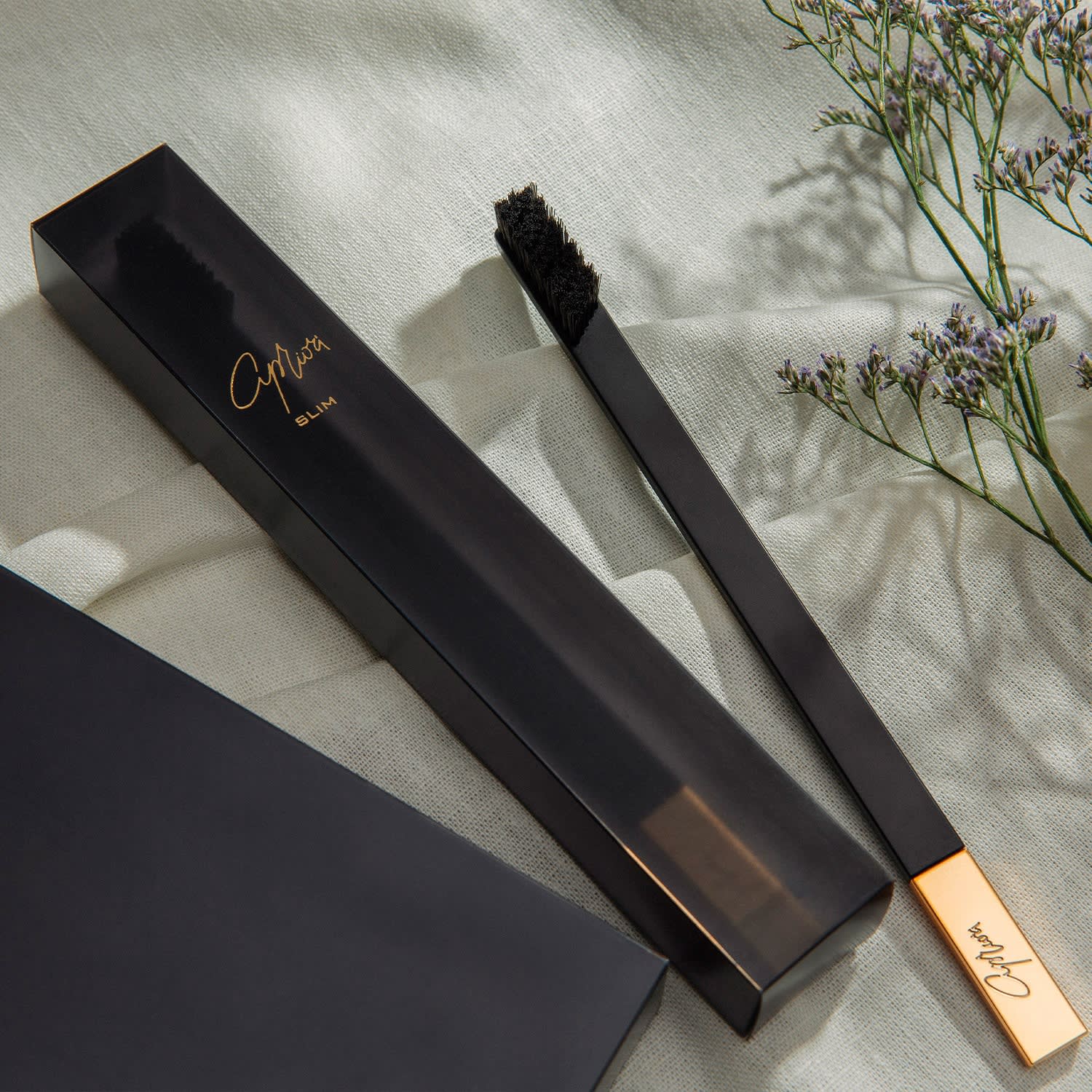 black and gold toothbrush