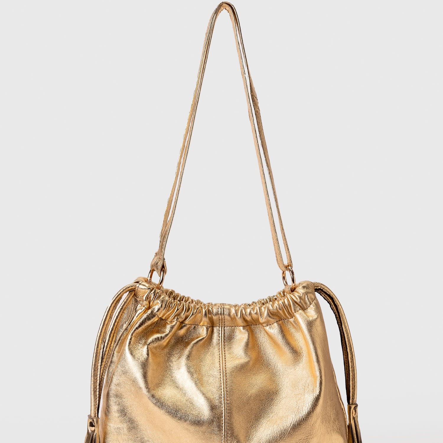 Gold Leather Clutch Bag With Tassels by JUAN-JO