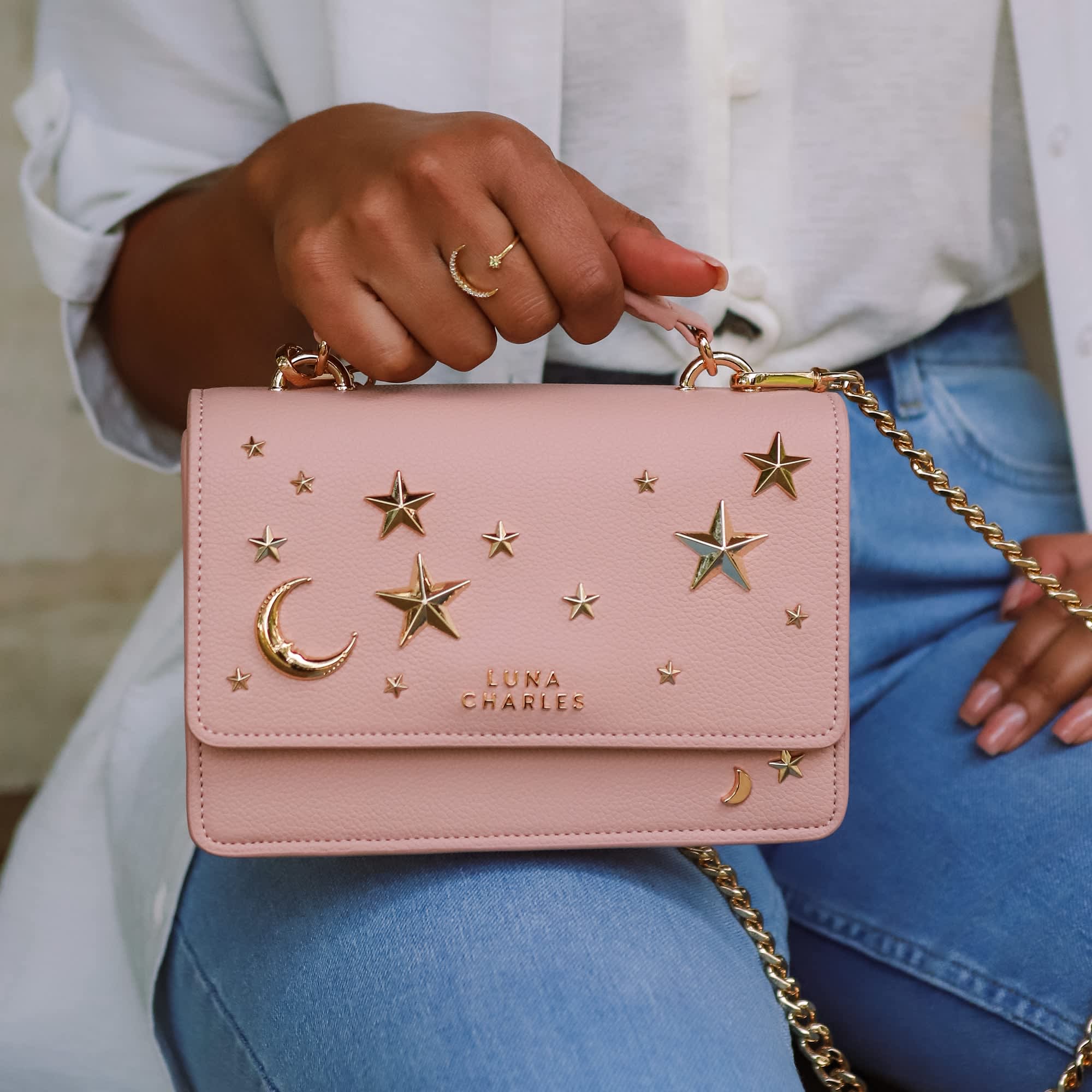 Gold studded handbag sale
