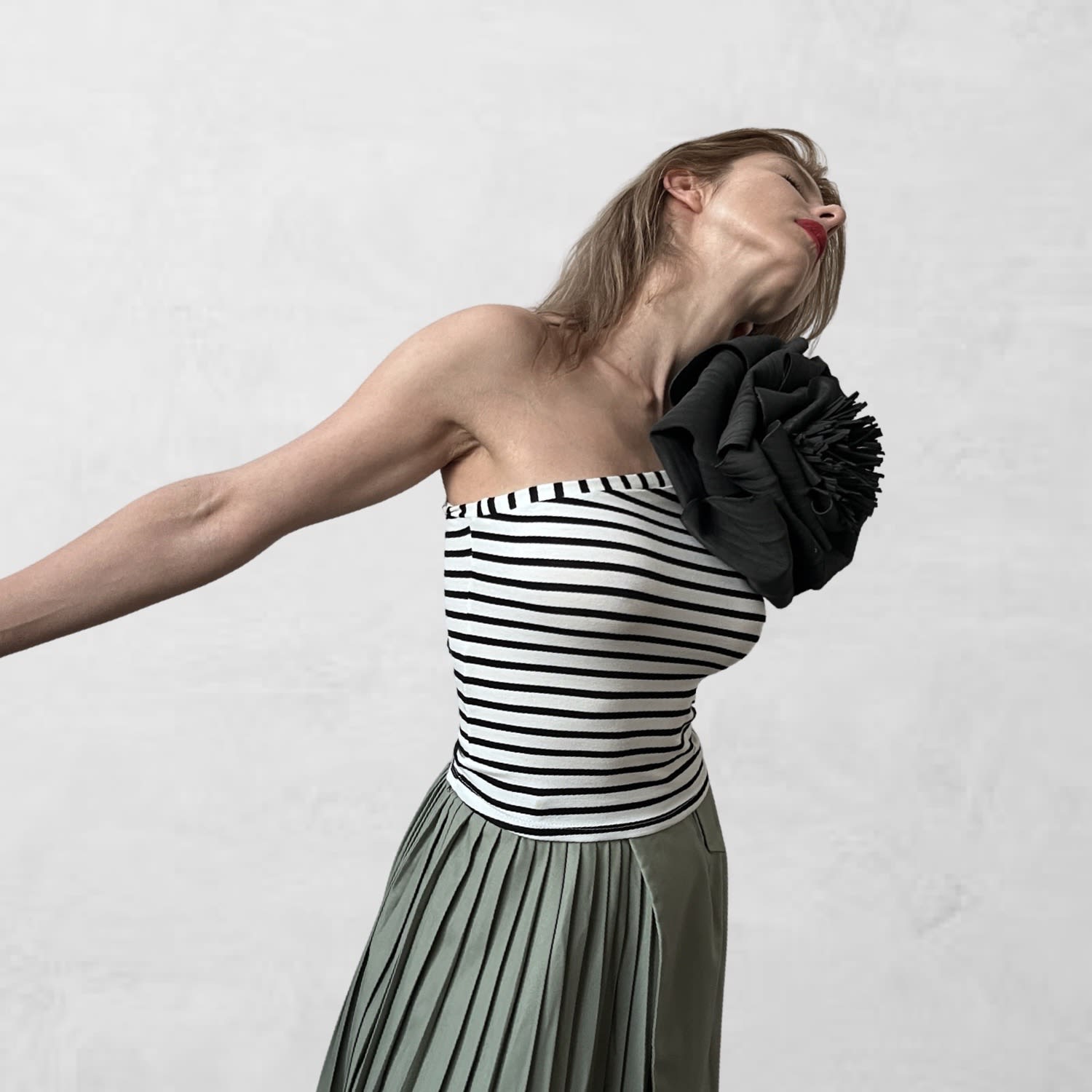 Striped One Sleeve Top With Black Flower Pin | London Striped One Sleeve Top With Black Flower Pin | London