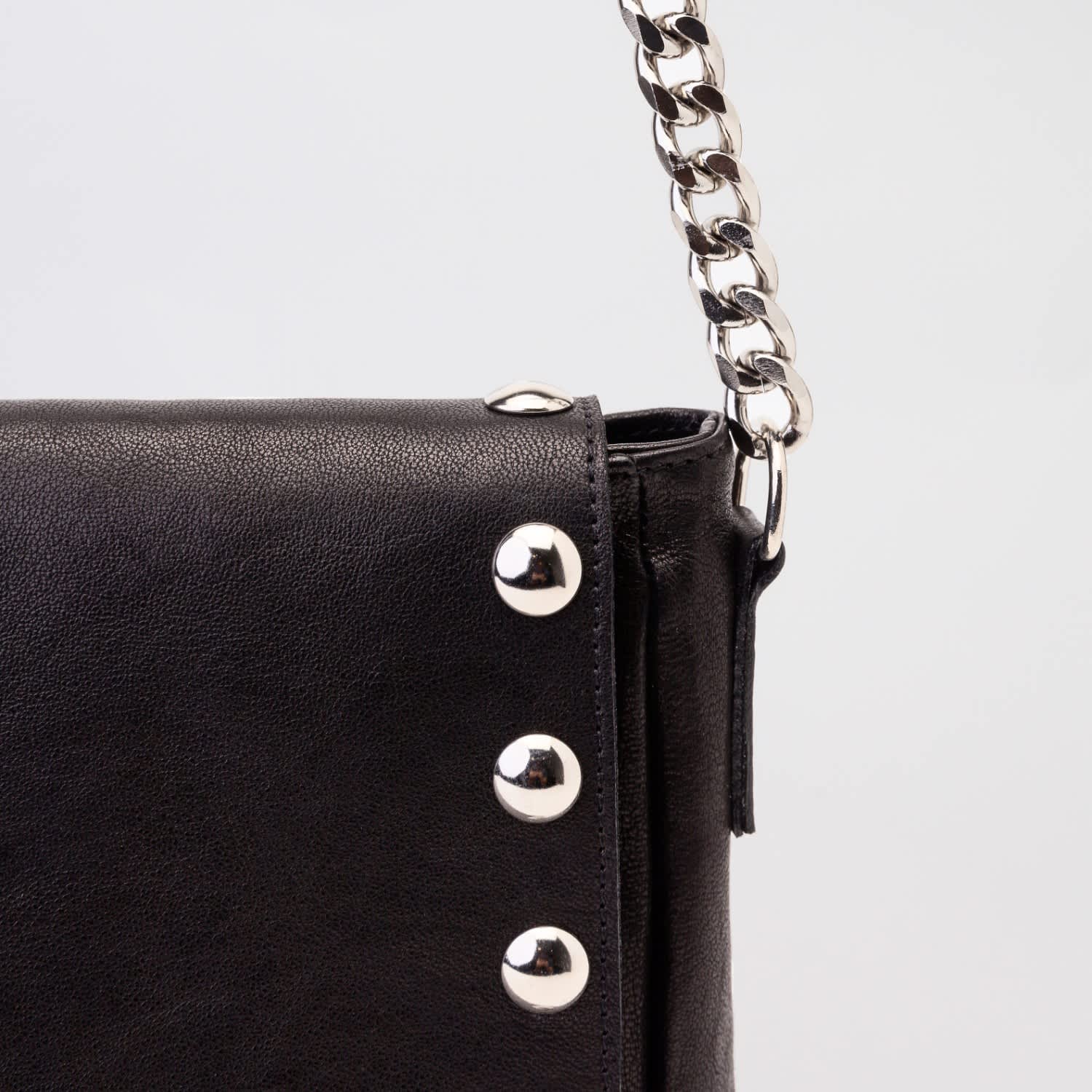 Black leather top studded crossbody bag
