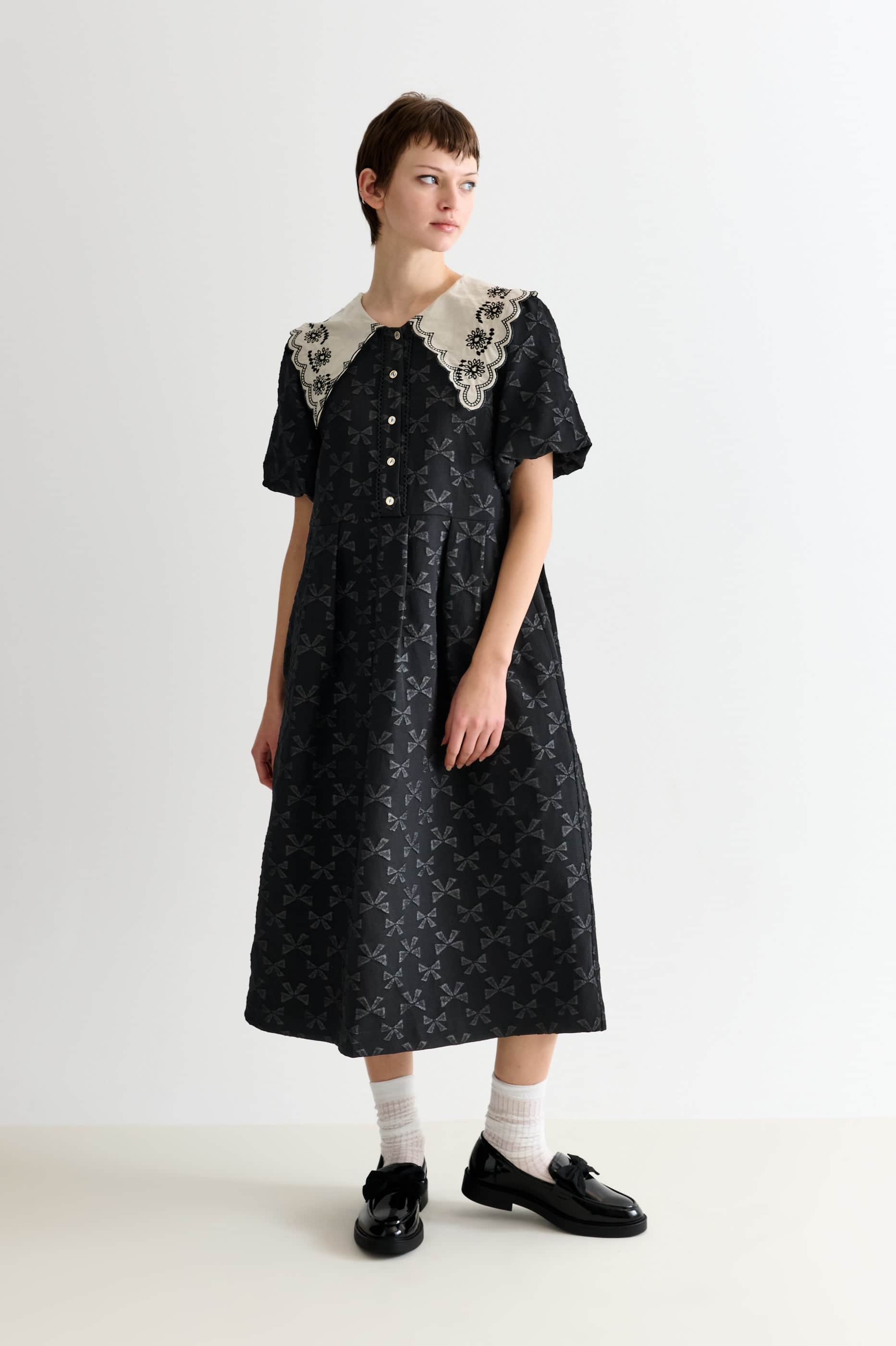 black and white embroidered dress & Midi - All Dresses and a graceful bottom hem accented with scalloped finishing Beaded Black and White Tea-length