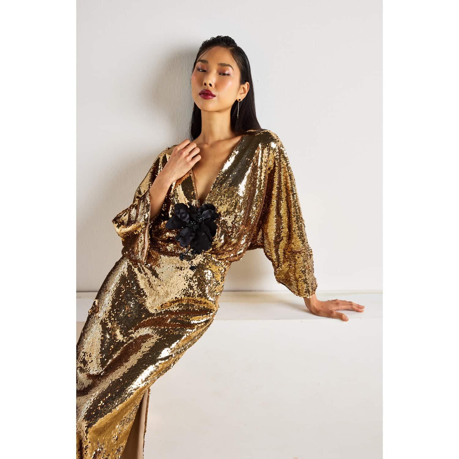 Sequin Gown With Flower Detail In Gold | BY FELIZIA | Wolf & Badger