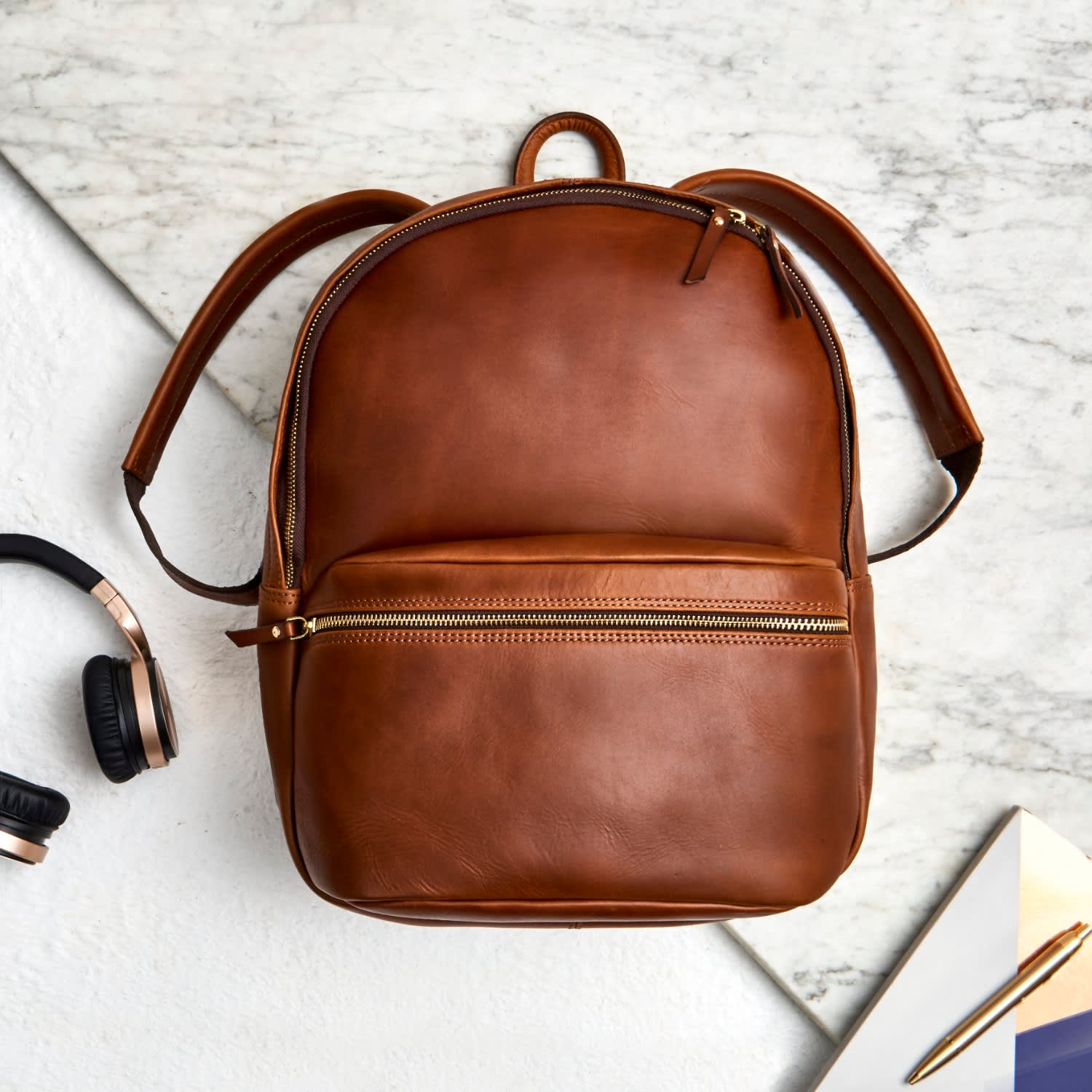 mens tan leather backpack