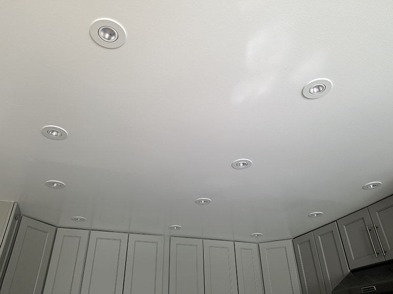 Recessed LED downlights installed across the new kitchen ceiling