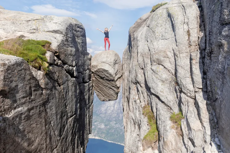 Portrait of a extreme plan travel for the girl on the stone of t