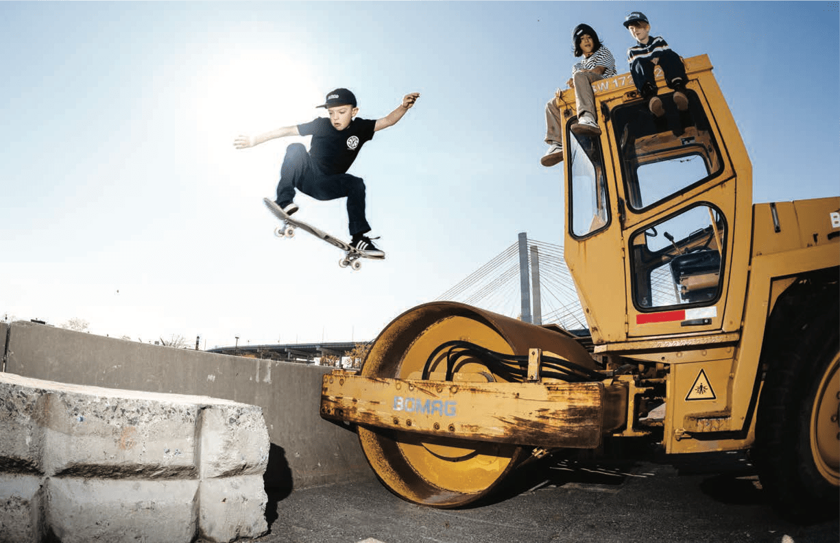 Kids skateboarding in industrial site, NYC