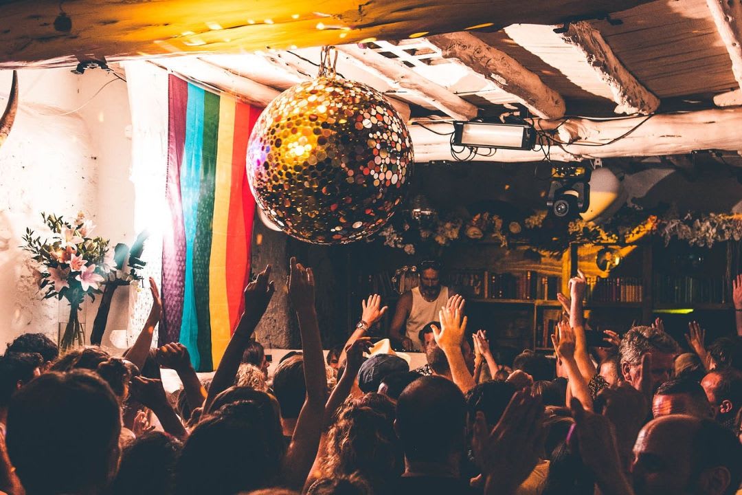 Clubbers dancing at Pikes, Ibiza