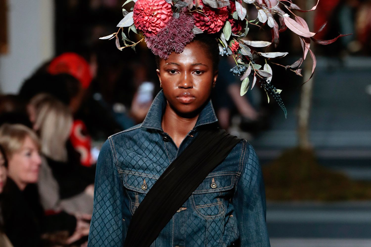 A woman with flowers on her head