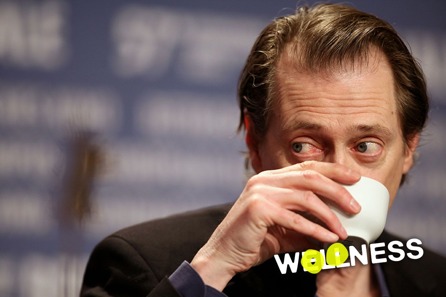 Man sipping coffee - a guide to waking up early