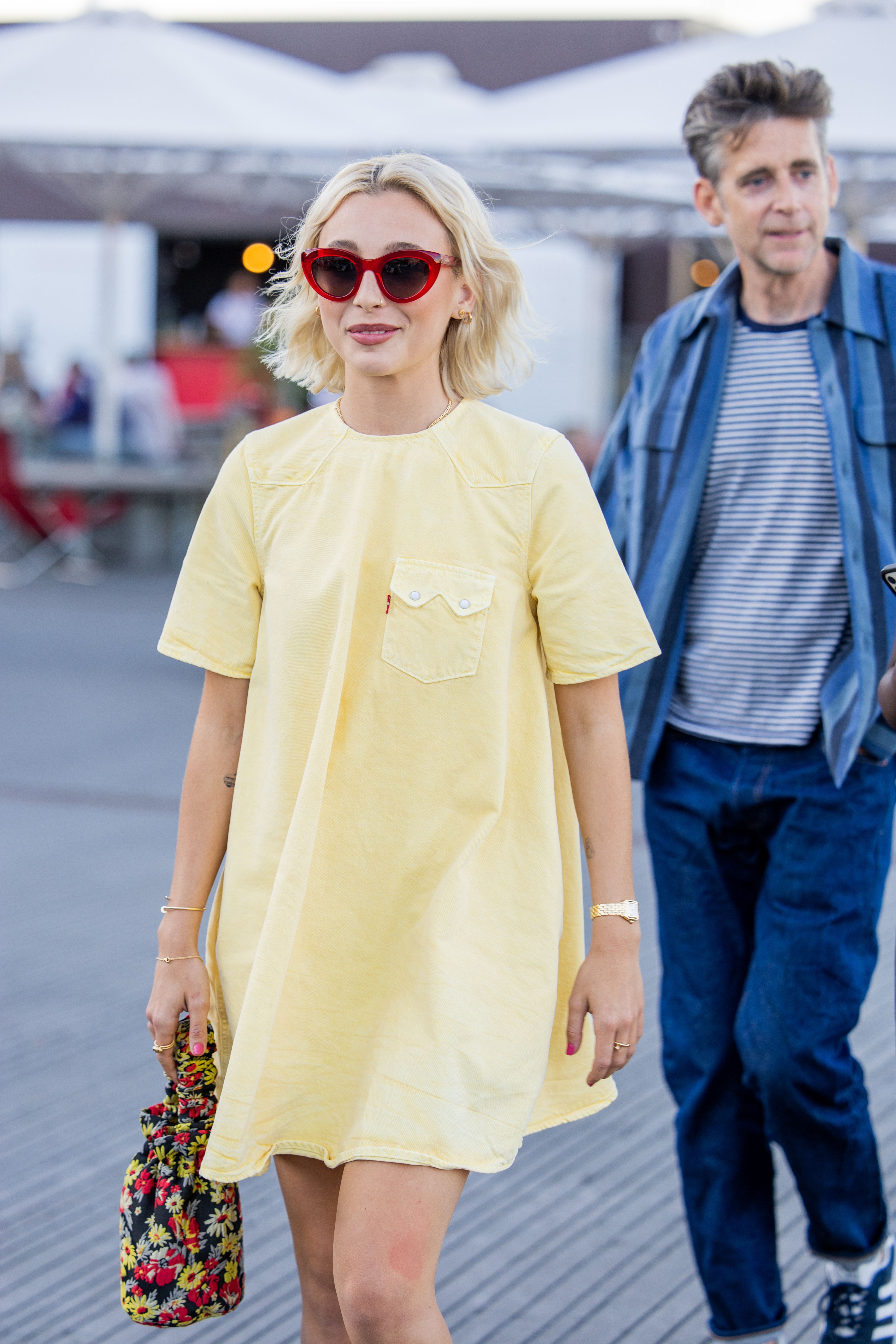 Emma Chamberlain Wears Lip Dress & Jean Boots for Loewe's Fashion Show –  Footwear News