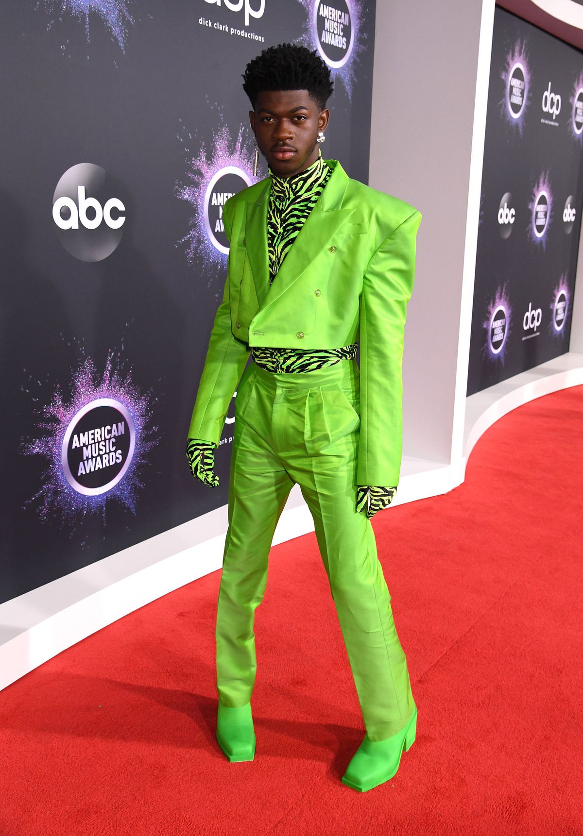 Lil Nas X and Elton John swap outfits, because of course