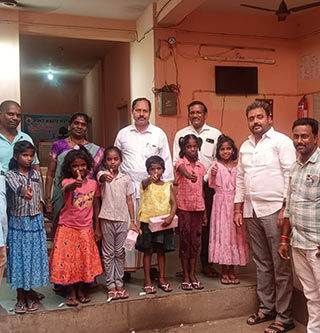Providing footwear to all the girl children at Annai Sathiya District Govt Home