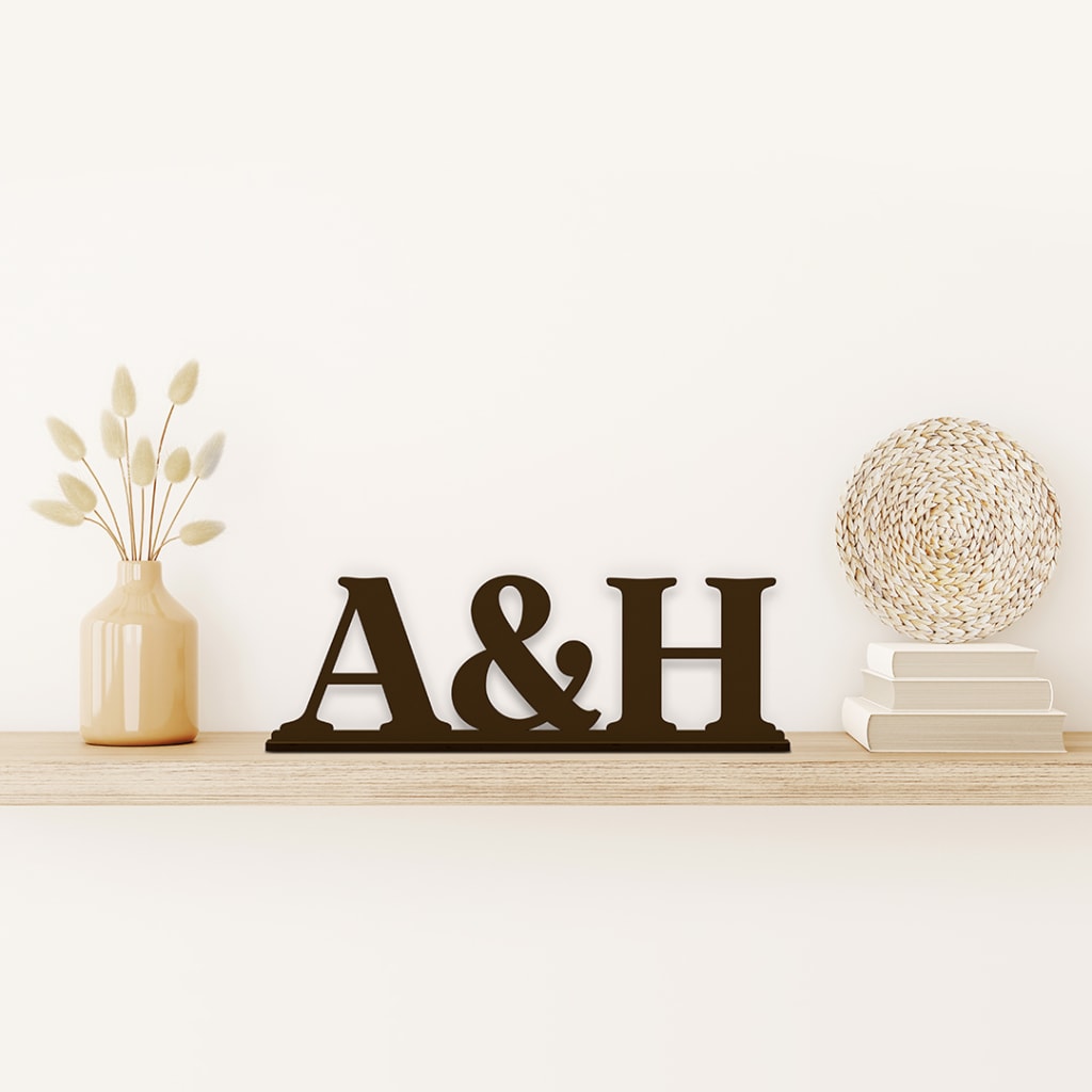 Decorative Letters Forming Word LOVE on Wooden Shelf on White Wall