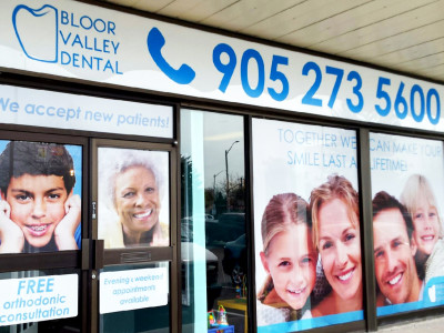 Perforated window graphics and vinyl change on fascia sign.