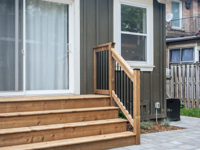 Comfortably exit your back door onto large deck landing and steps