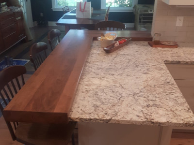 3 of 4: Custom kitchen in a century home; custom bar top seating