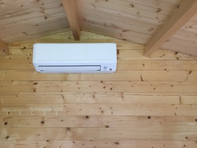 Log cabin air conditioner heat pump installation Wolverhampton West Midlands with0% vat.