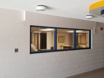 2 of 2: expanded office window in school foyer