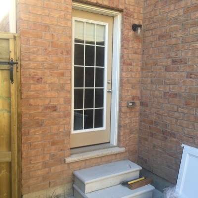 Photo 1 - home with out the storm door