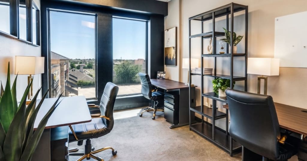Three-desk private office with window views, sized for a small law firm