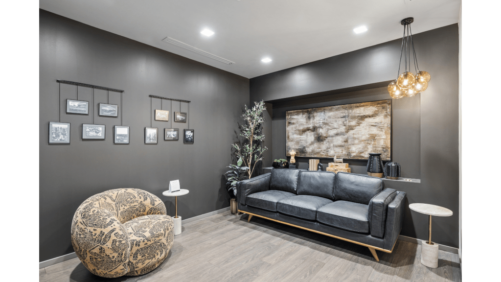Comfortable lounge at Lucid Scottsdale/Old Town featuring modern seating, artwork, and a welcoming atmosphere.