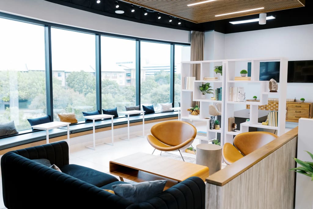 Lucid Private Offices open coworking space with floor-to-ceiling windows and modern workstations