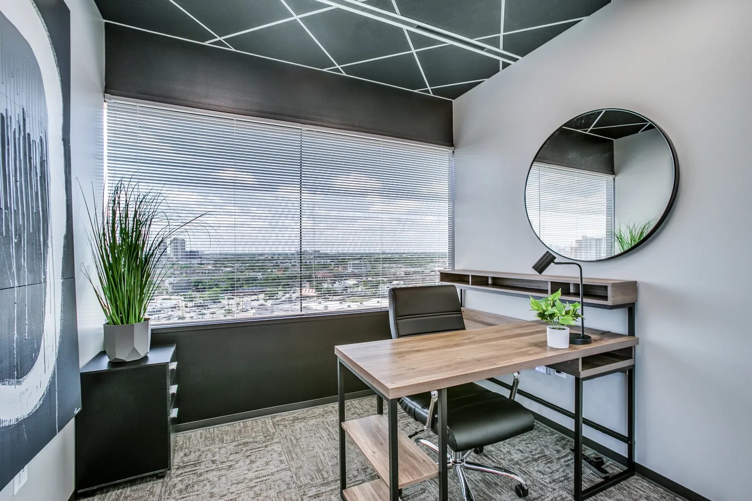 Furnished private office space with modern decor at Lucid Private Offices Uptown Houston
