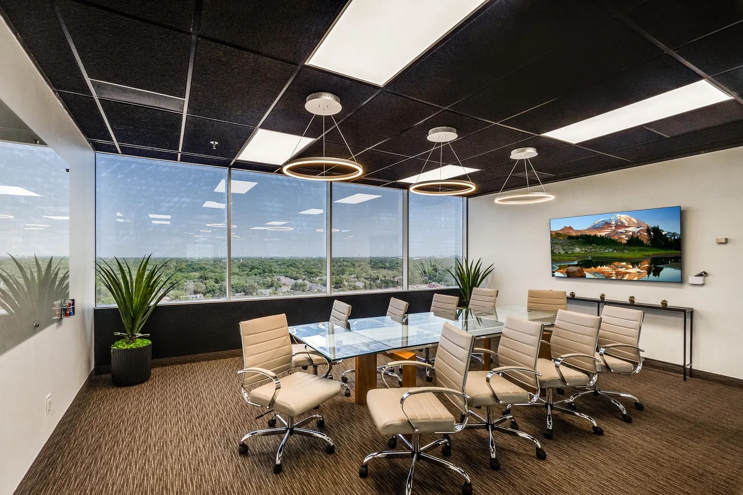 Conference room at Lucid Private Offices LBJ Freeway / Farmers Branch with city views and modern meeting space.