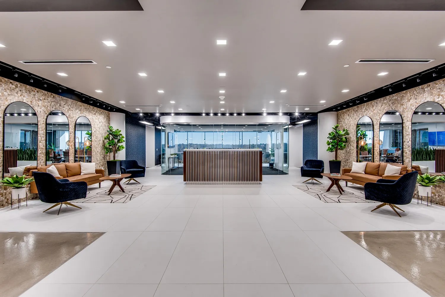 Spacious coworking lobby at Lucid Private Offices Las Colinas with modern lounge seating
