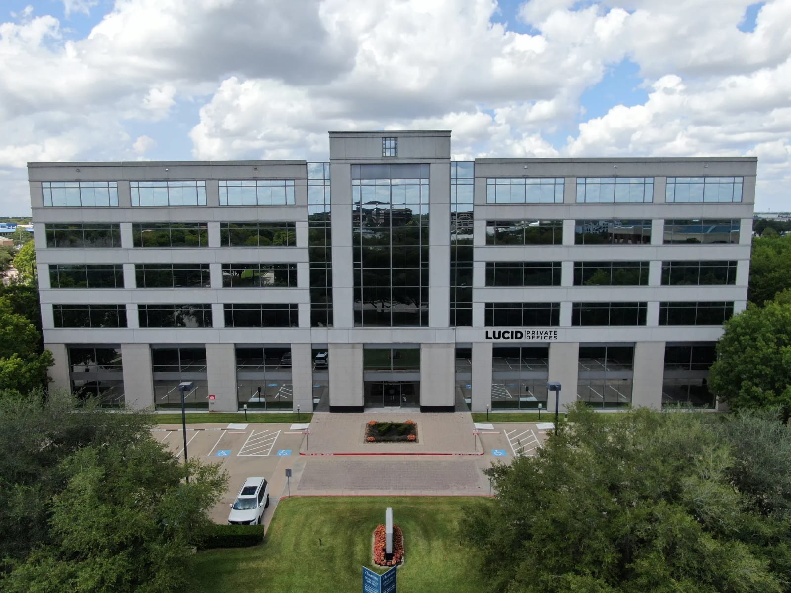 Lucid Private Offices Sugar Land building exterior at 77 Sugar Creek Center Blvd
