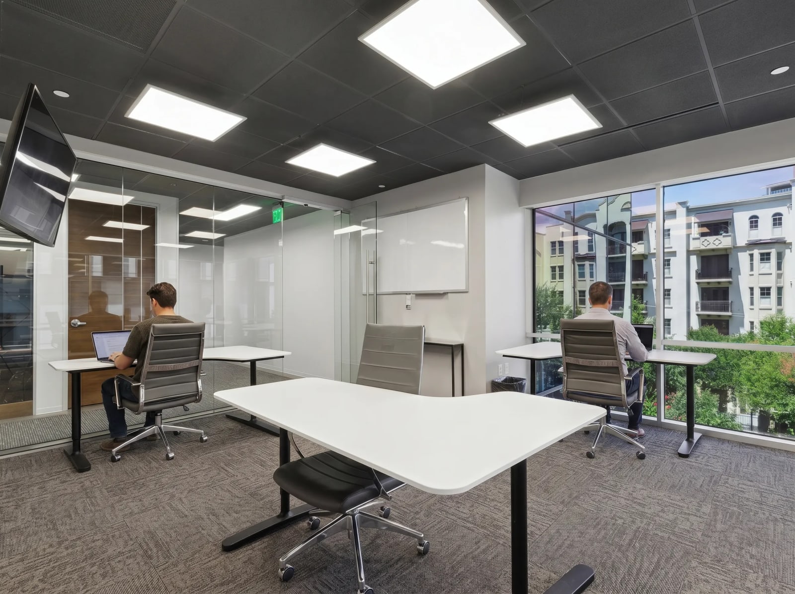 Team office suite with multiple desks for private office coworking at Lucid Private Offices Uptown Dallas
