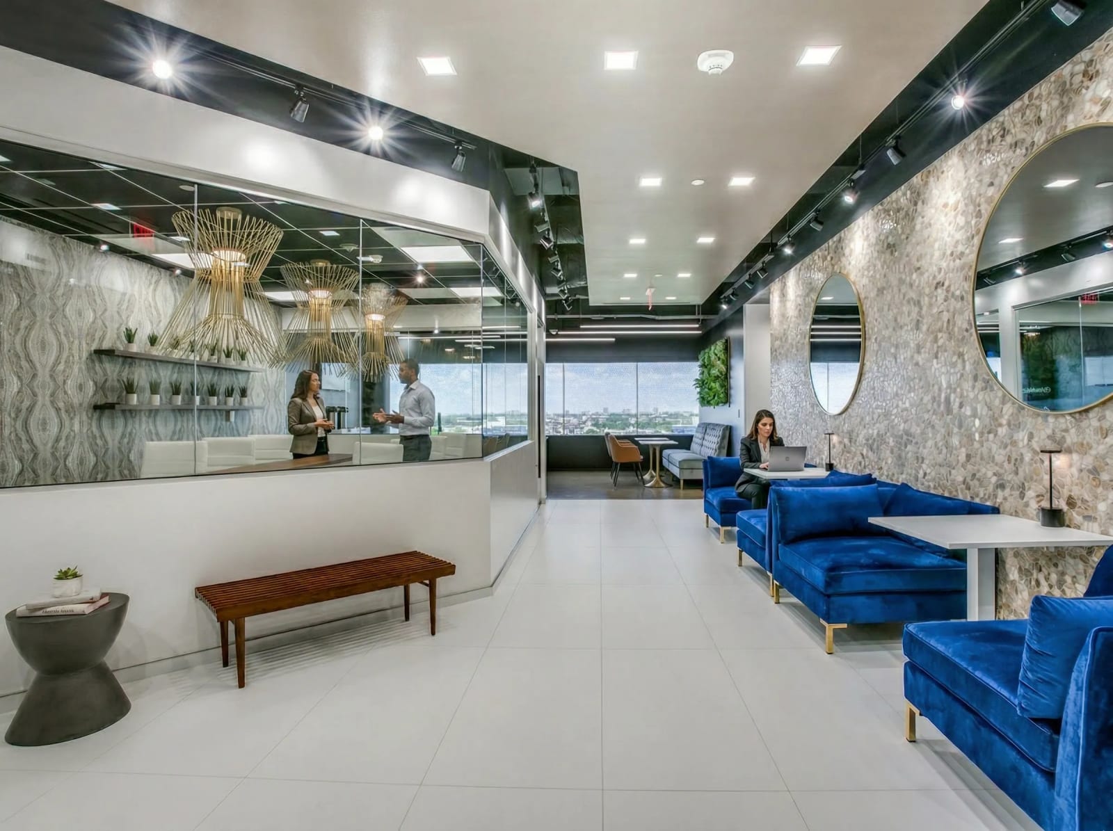 Uptown Houston coworking lounge area with modern seating and collaborative workspace