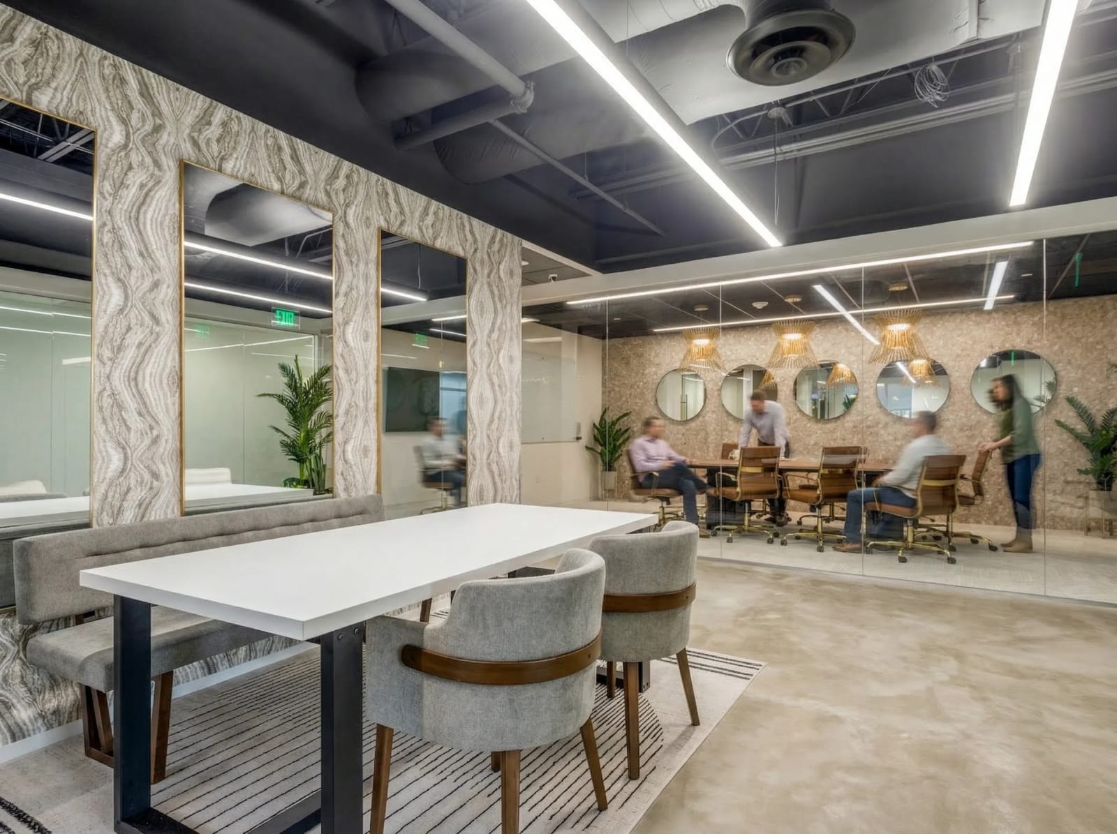 Meeting room at Lucid Private Offices The Woodlands with tables and chairs for corporate events