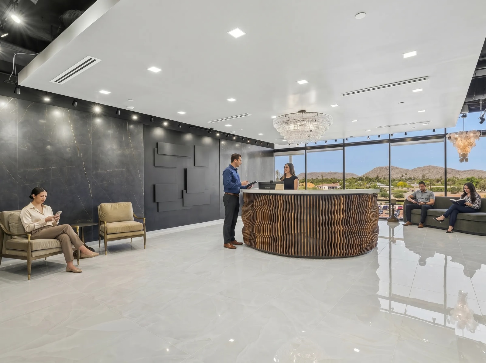 Visitors in the Lucid Private Offices Scottsdale/Old Town lobby with modern seating and mountain views.