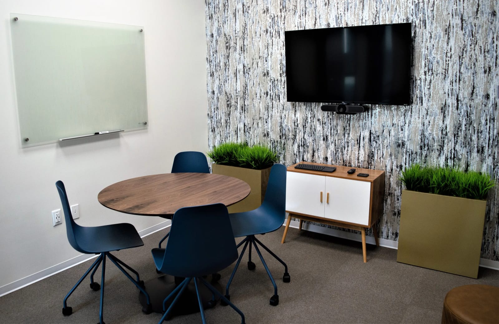 Meeting room at Lucid Private Offices Southlake Town Square with video conferencing and collaborative workspace.