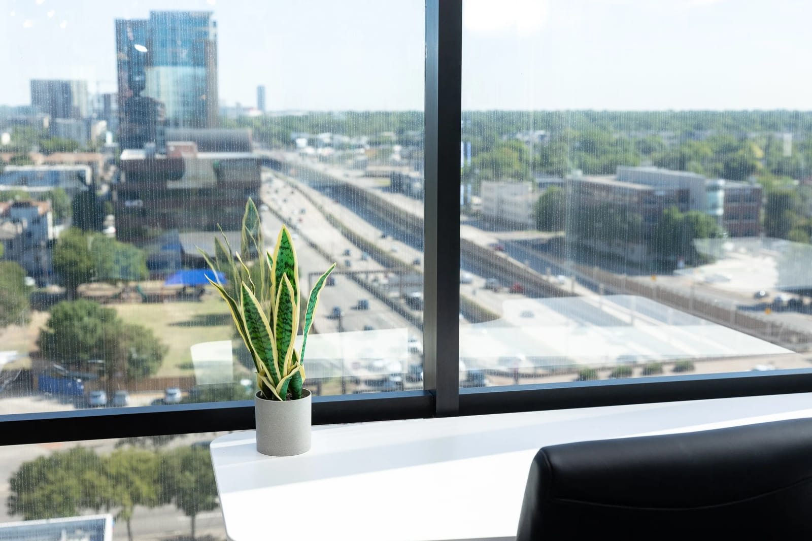 Dallas city skyline view from private office at Lucid Private Offices Uptown Dallas location