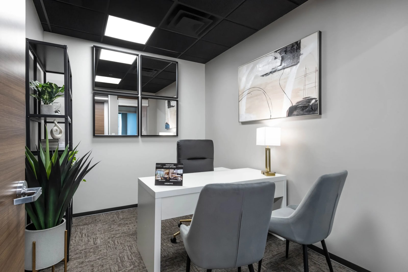 Team suite private office with multiple workstations and modern design
