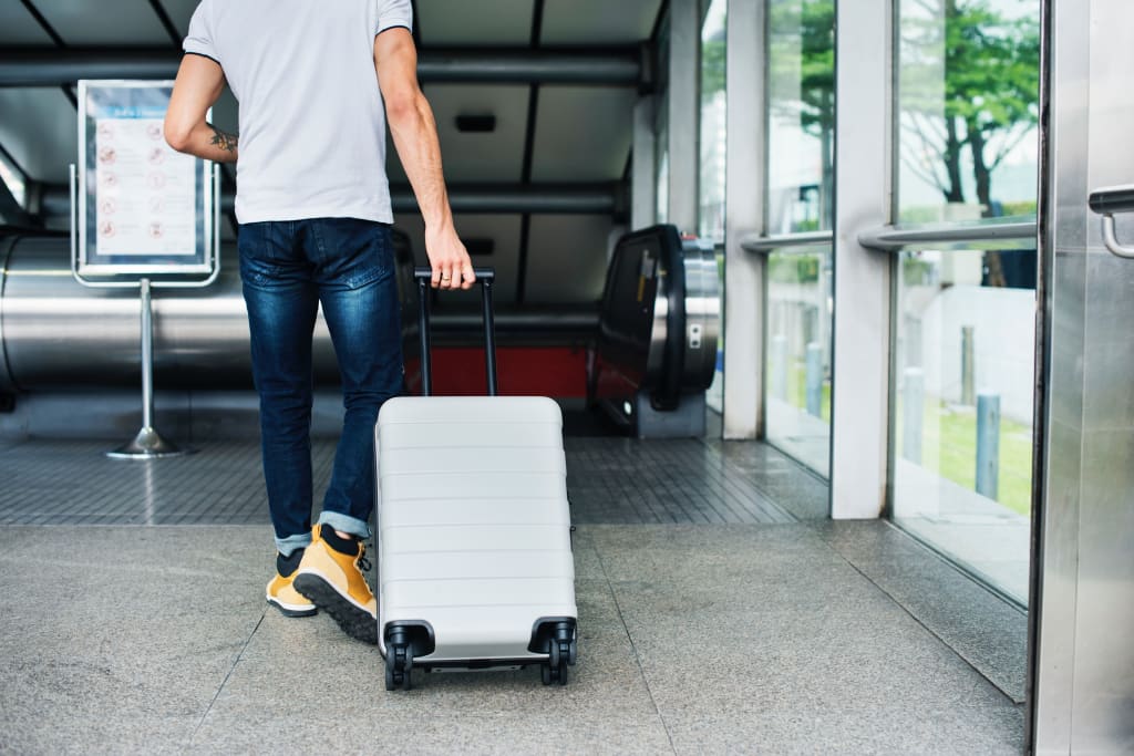 Packing suitcase at home with woman items, accessories, Stock image