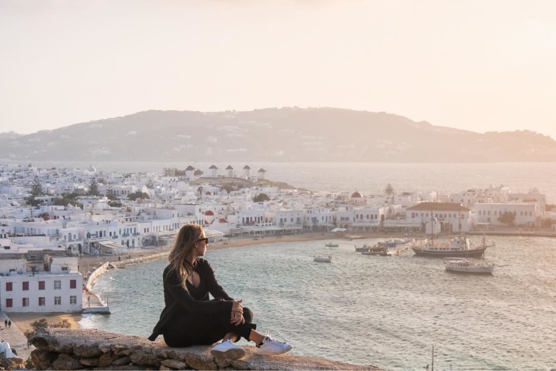 Girl in a viewpoint in Mykonos island, Greece