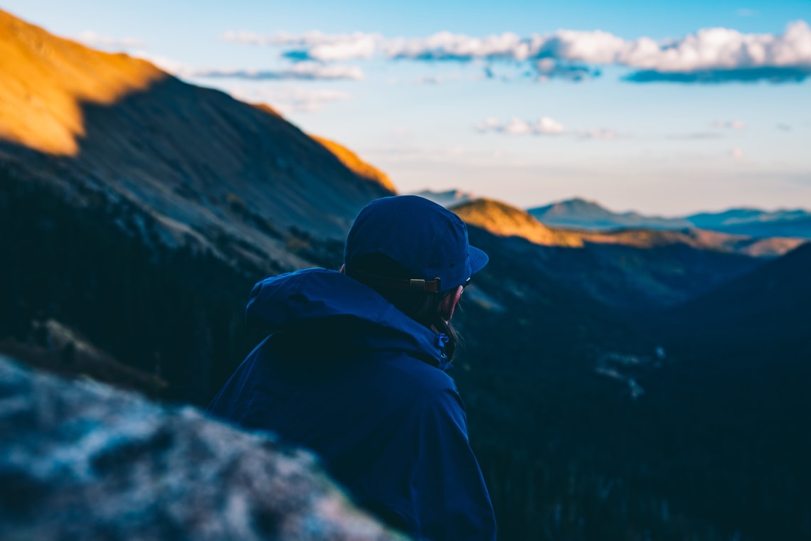 Solo traveler enjoying a mountain view, Colorado, United States