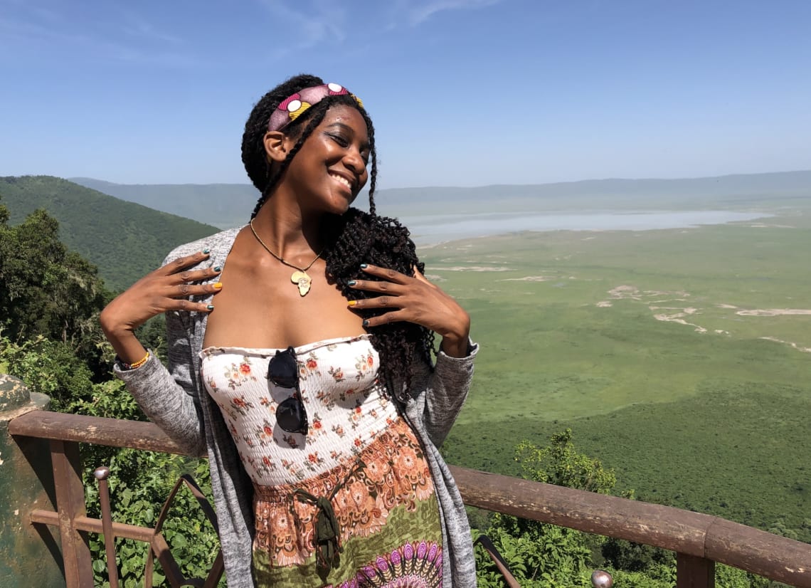 Girl posing for a photo in a lookout