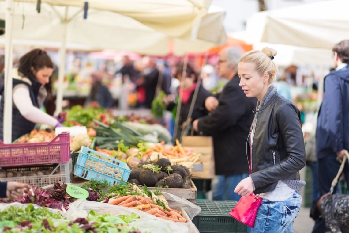 Girl doing groceries in a veg market in Germany 