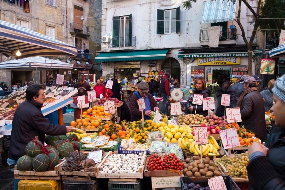 Street market in Italy. Grocery shopping is a great option to eat vegan in Italy