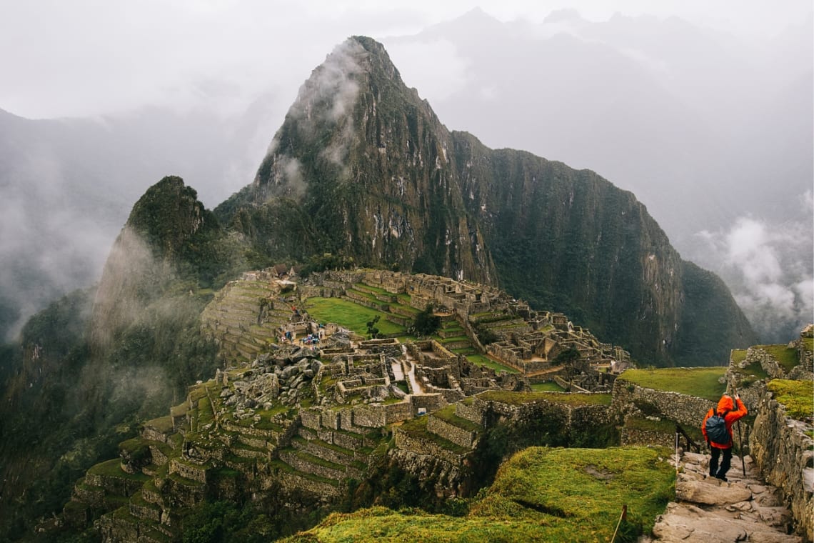 Hiker in Machu Picchu, Peru, a spiritual travel destintation