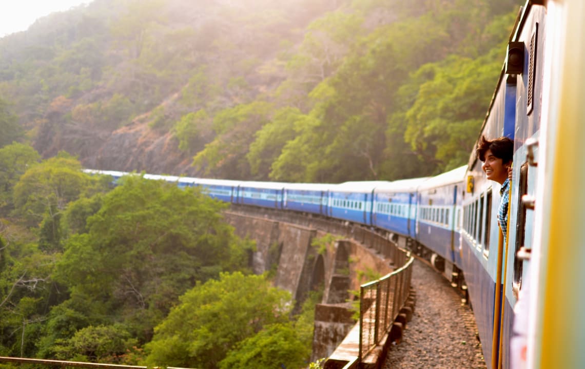 Traveler on a train enjoying the scenery