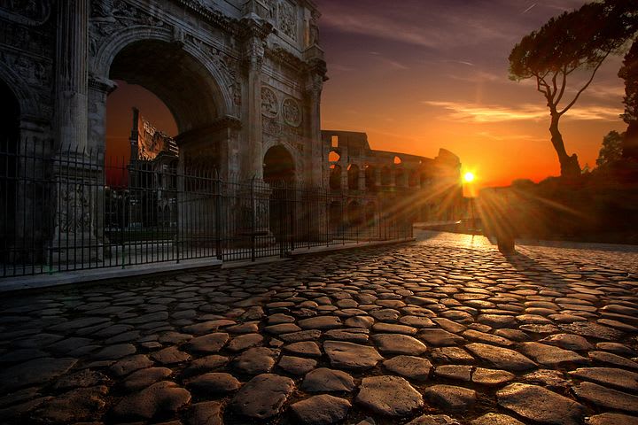 La guía definitiva para explorar Roma como un local - Worldpackers - atardecer en Roma