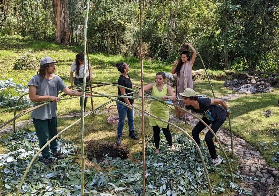 Group of volunteers helping in a farm with sustainable living practices